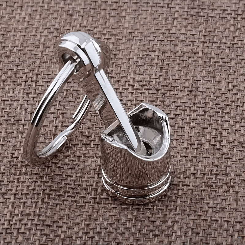 Car Engine Piston Keychain In Hand Showing Size And Finish HR3610276